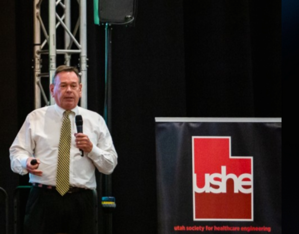 Thom-speaking-at-the-Utah-conference